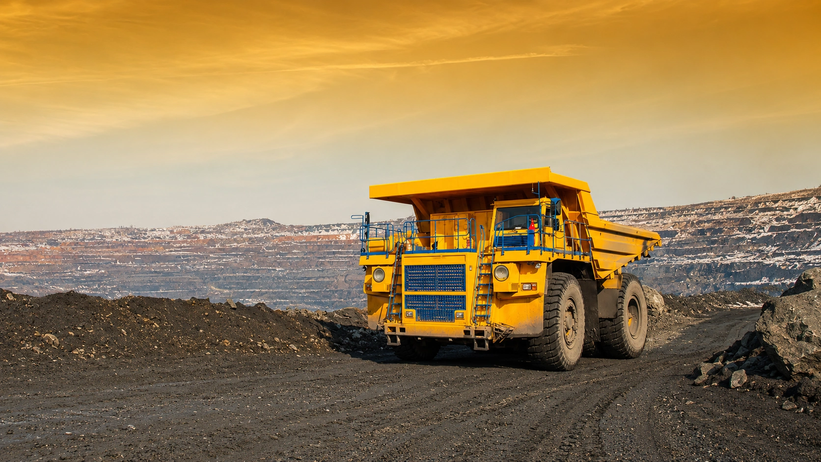 Heavy mining haul truck operating in an open-pit mine