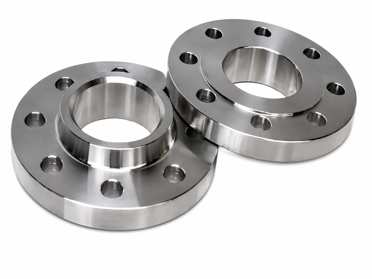 Two precision-machined Inconel 625 forged flanges for nuclear and subsea applications.